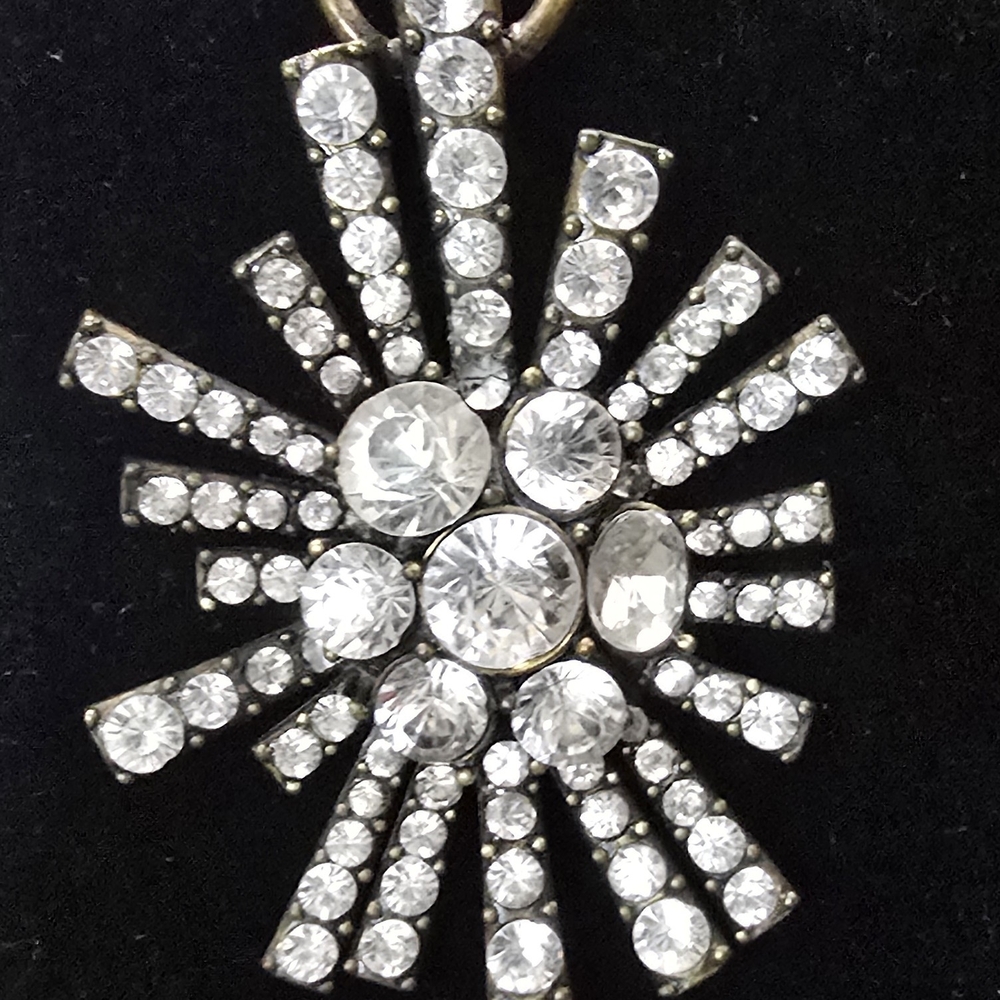 Express Crystal Starburst Pendant On a Long Oxidized Gold Chain